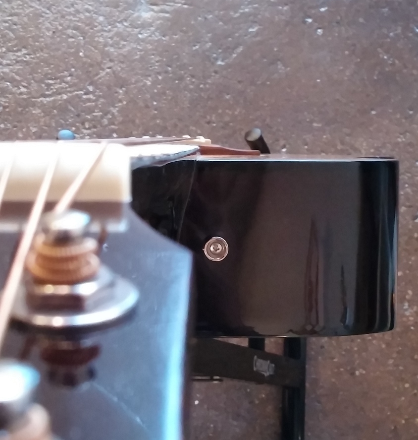Truss rod adjustment process with allen wrench